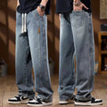 Men's Washed Light Blue Relaxed Fit Drawstring Wide Leg Jeans